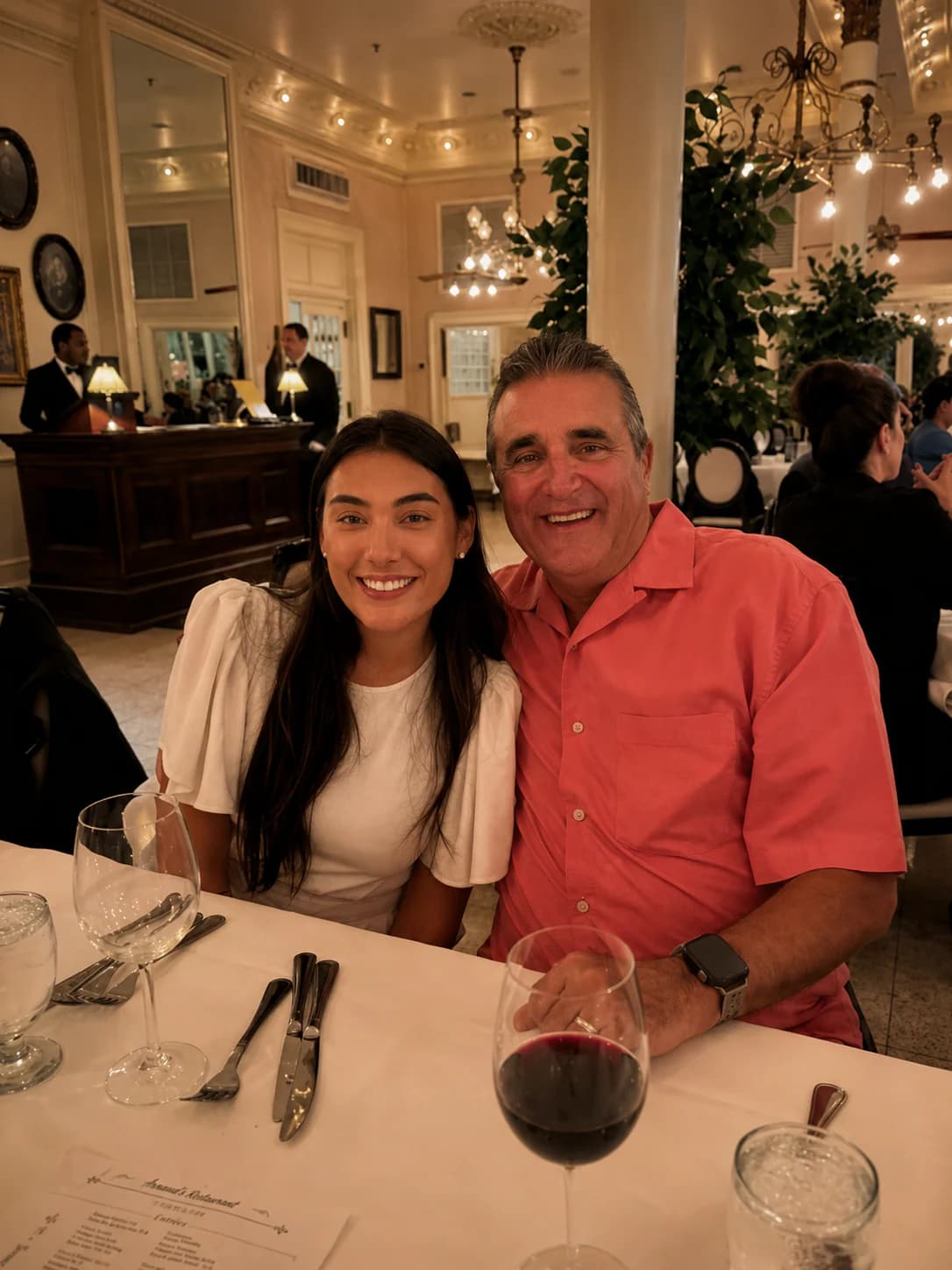 Two Friends of Aviation attendees smiling at the dinner table