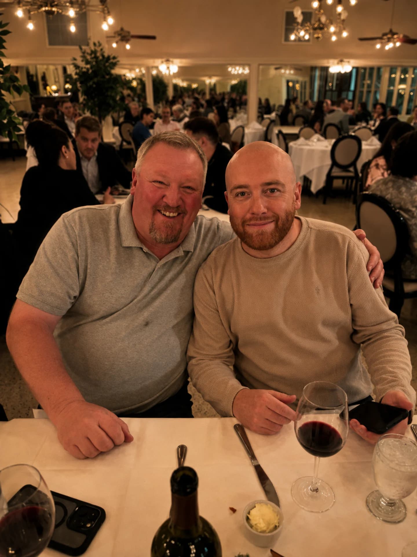 Two guests seated together during the Friends of Aviation dinner