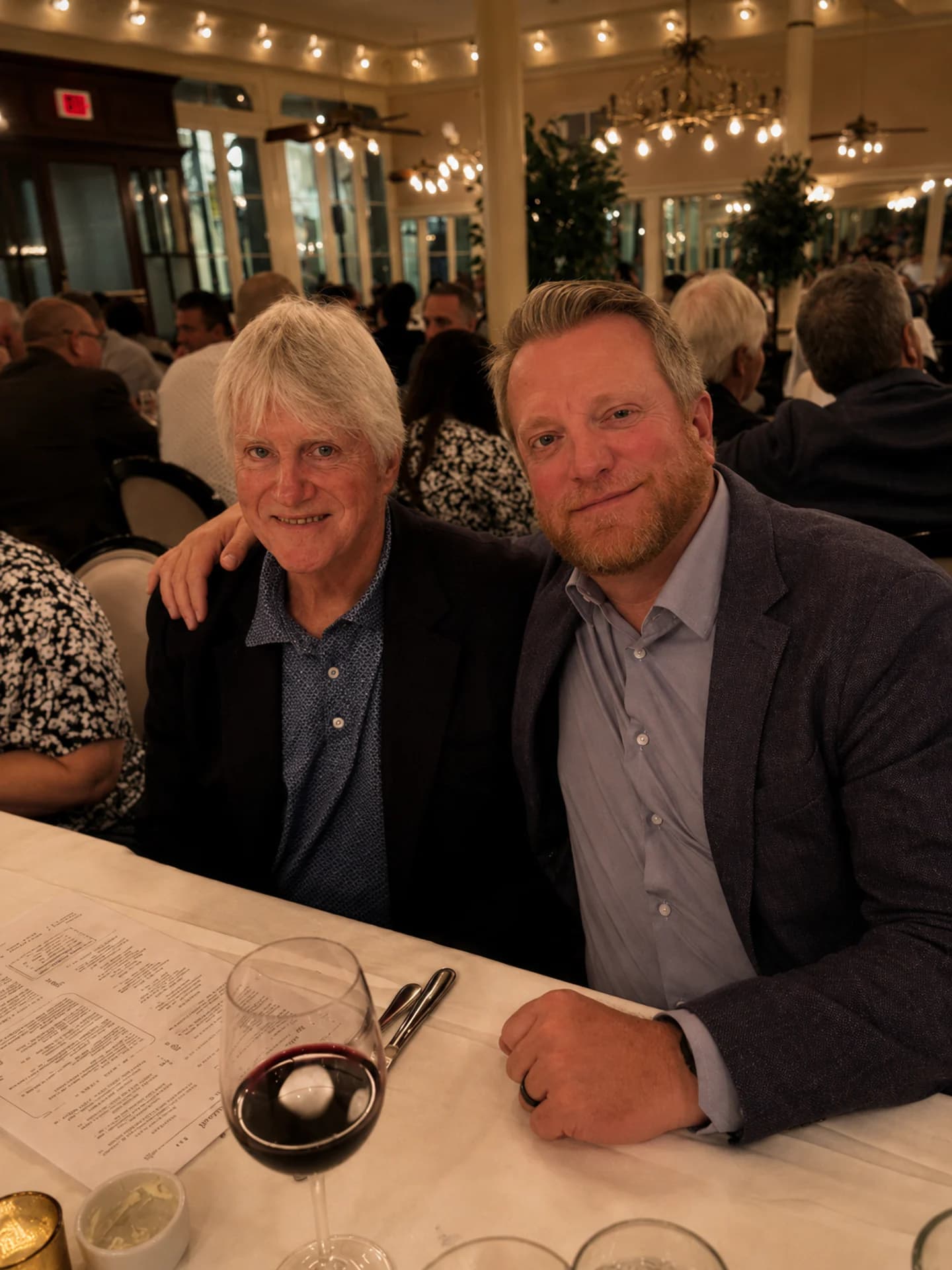 Two attendees gathered at the table during the evening