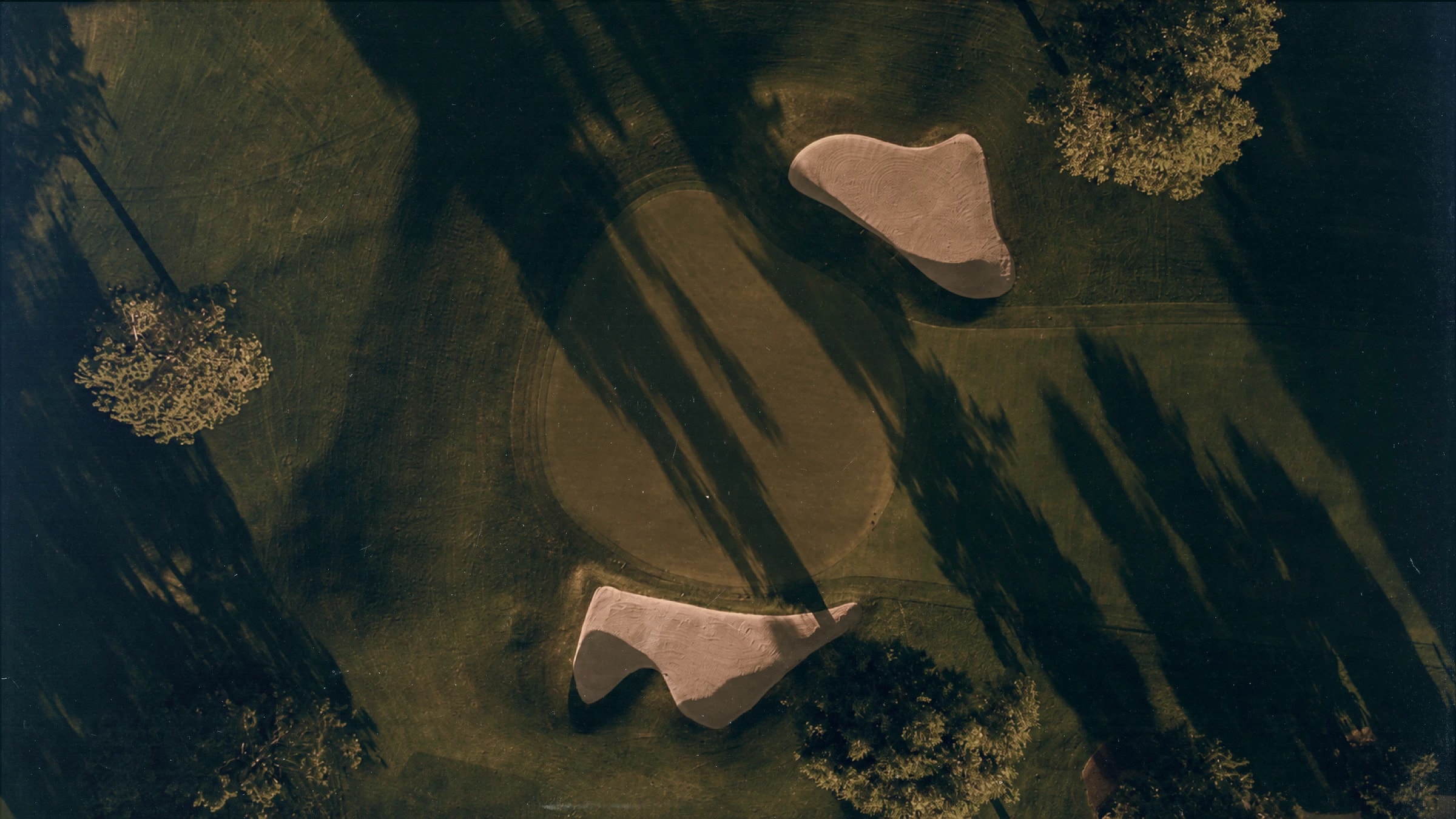 An overhead view of the course at low sun