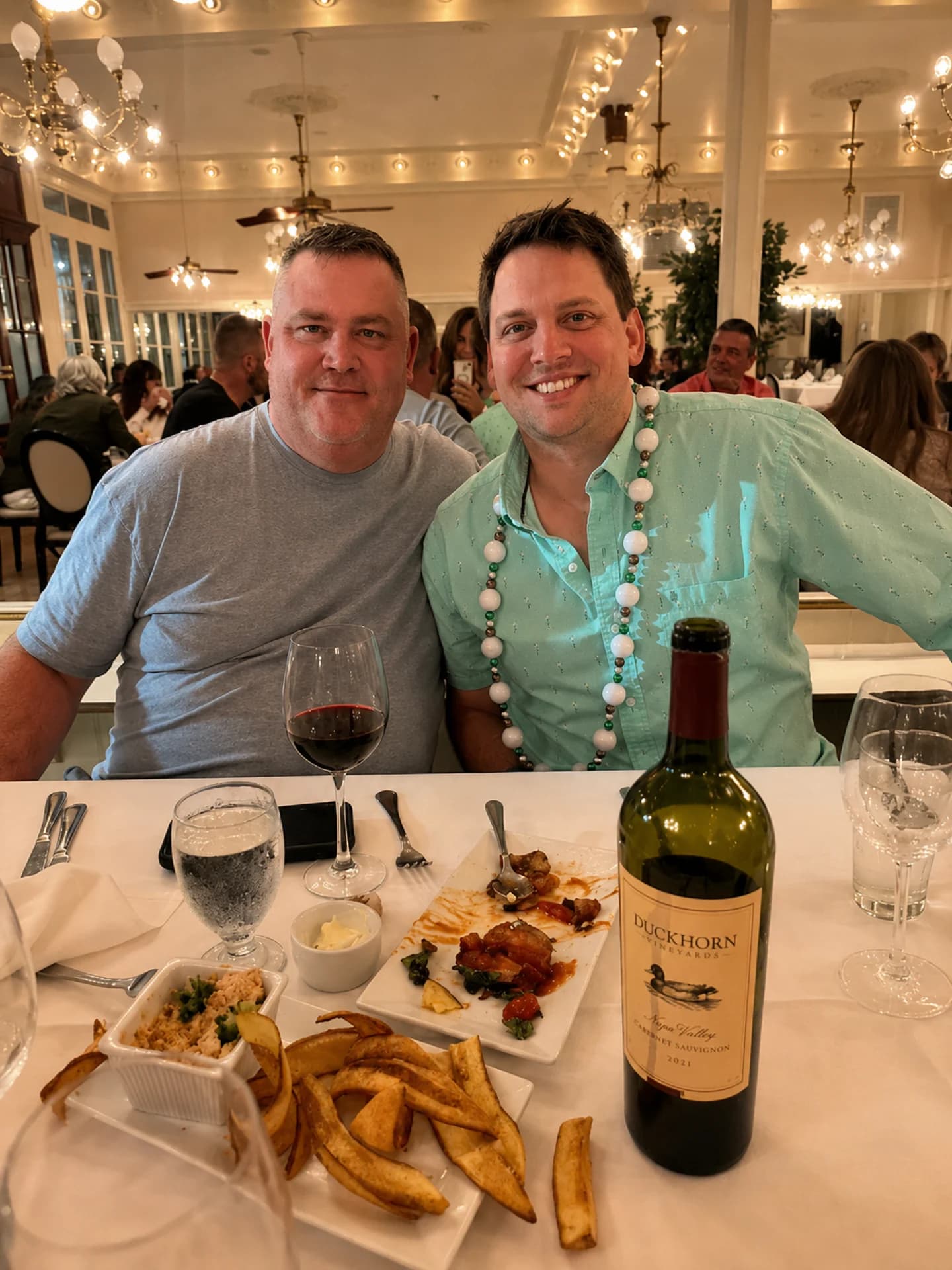 Two Friends of Aviation guests seated together at dinner
